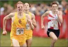  ?? (NWA Democrat-Gazette/Andy Shupe) ?? Max Girardet (left) of Central Catholic High School in Portland, Ore., pulls away from Connor Burns (right) of Southern Boone in Ashland, Mo., and teammate Wes Shipsey to win the high school boys race during the Chile Pepper Cross Country Festival on Saturday at Agri Park in Fayettevil­le. More photos are available at arkansason­line.com/103chileru­n/