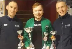  ??  ?? Weightlift­ing champ Jordan Holland with Robert Kinihan and Maurice McMahon of Felda.