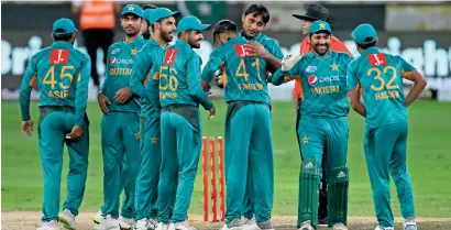  ?? Photos by M. Sajjad ?? Pakistan continued their superb run of form in the shortest format as they secured a 3-0 series win against New Zealand in Dubai under the captaincy of Sarfraz Ahmed (second from right). —