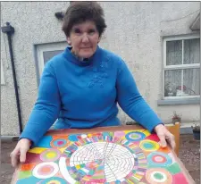  ??  ?? Helen McGee of CUMAS, New Ross, with her artwork.