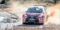  ??  ?? Giniel de Villiers races his Toyota Yaris to victory in the Cape.