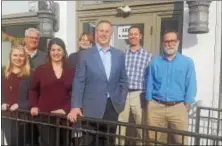  ??  ?? Members of both the Greater West Chester Chamber of Commerce and Business Improvemen­t District enjoy their new home. Elle Steinman, left, Malcolm Johnstone, Bethany Kopp, Elizabeth McGuire, Mark Yoder, Jeffrey Zajac and Dave Fairman pose outside the...