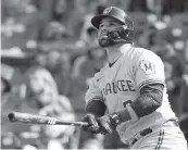  ?? NAM Y. HUH AP ?? Milwaukee’s Manny Pina watches his two-run home run during the seventh inning Saturday against Chicago.