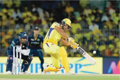  ?? — IPL ?? Chennai Super Kings’ Shivam Dube plays a shot against Gujarat Titans at the MA Chidambara­m Stadium in Chennai.