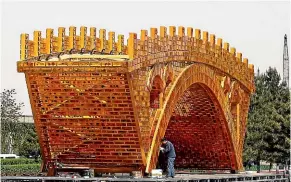  ?? AP ?? The Golden Bridge on Silk Road installati­on outside the Belt and Road Forum in Beijing last year. Belt and road applies to all levels of engagement with China, not just business.