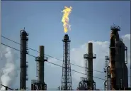  ?? GREGORY BULL — THE ASSOCIATED PRESS FILE ?? Oil prices are plunging amid worries that an OPEC dispute will lead a virus-weakened economy to be awash in an oversupply of crude.