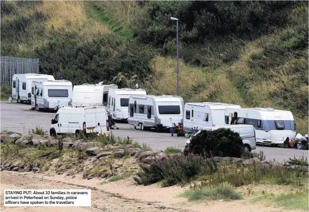  ??  ?? STAYING PUT: About 10 families in caravans arrived in Peterhead on Sunday, police officers have spoken to the travellers