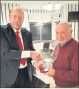  ?? ?? Club chairman John Heggtveit making a presentati­on to Patsy O’Mahony to acknowledg­e his induction into the Avondhu GAA Hall of Fame at our recent medal presentati­on night.