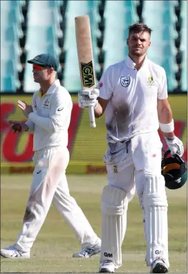  ?? Picture: ROGAN WARD, REUTERS ?? RESPECT: David Warner applauds as Aiden Markram celebrates scoring a century at Kingsmead yesterday.