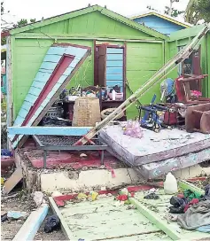  ?? FILE PHOTOS ?? A house which damaged during the passage of Hurricane Ivan in 2004.