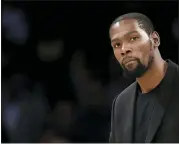  ?? MARCIO JOSE SANCHEZ — THE ASSOCIATED PRESS FILE ?? FILE- In this March 10, 2020, file photo, Brooklyn Nets’ Kevin Durant watches during the second half of the team’s NBA basketball game against the Los Angeles Lakers in Los Angeles.