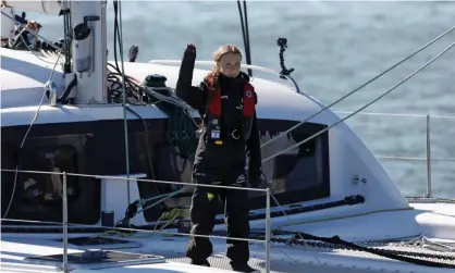  ??  ?? Greta Thunberg arrives in Lisbon on La Vagabonde, which leaves little or no carbon footprint when its sails are up, using solar panels and hydro-generators for electricit­y. Photograph: Pedro Nunes/Reuters