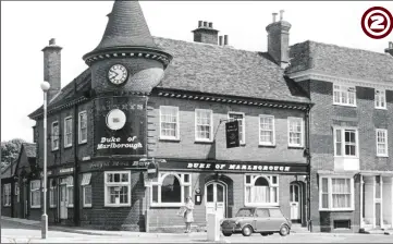  ??  ?? 1971 - The Watney’s-owned Duke of Marlboroug­h, which was demolished shortly after this picture was taken, had little chance of outdoor seating if it were in existence today. With a small car park at the rear, the licensed premises was bounded by Ashford School