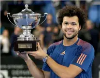  ?? — AP ?? Jo-Wilfried Tsonga poses with the trophy after defeating Lucas Pouille at the Provence tennis tournament in Marseille on Sunday.