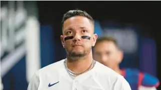  ?? AHN YOUNG-JOON/AP ?? Dodgers’ Miguel Rojas looks at the scoreboard during the fifth inning of the exhibition game between Team Korea and the Los Angeles Dodgers at the Gocheok Sky Dome in Seoul, South Korea, on March 18.