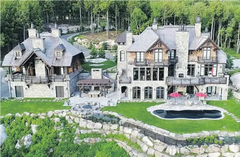  ?? NAT LAPOINTE / THE CANADIAN PRESS ?? Former NHL superstar Mario Lemieux’s summer home is known as the Château Fleur de Lys, has eight bedrooms and nine bathrooms and “offers a majestic panoramic view” of Lake Tremblant.