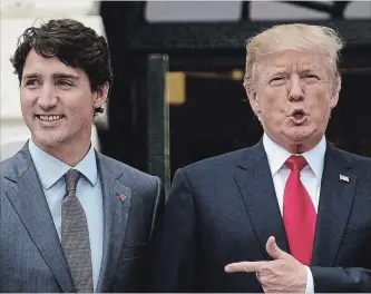  ?? SEAN KILPATRICK
THE CANADIAN PRESS FILE PHOTO ?? U.S. President Donald Trump said that after Trudeau told him the U.S. does not have a trade deficit with Canada, he replied, “Wrong, Justin, you do.”