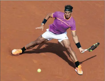  ?? Picture: EPA, TONI ALBIR ?? THAT ELEGANT RAFA SLIDE: Will Dewald Human be able to do his own sliding over the trylines of Paris?