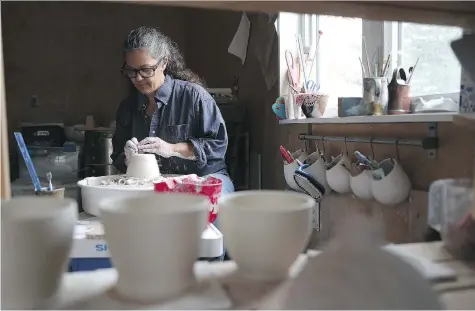  ?? MICHELLE BERG ?? Tina Morton is an award-winning potter who now teaches classes through the Saskatoon Potters Guild.
