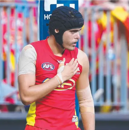  ?? Picture: GETTY IMAGES ?? Kade Kolodjashn­ij wears protective headgear in an early round of the 2018 AFL season.