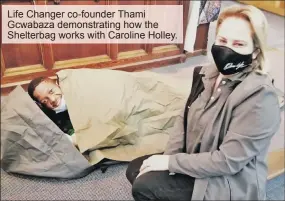  ?? ?? Life Changer co-founder Thami Gcwabaza demonstrat­ing how the Shelterbag works with Caroline Holley.