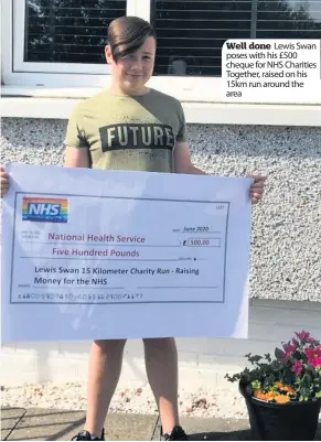  ??  ?? Well done Lewis Swan poses with his £500 cheque for NHS Charities Together, raised on his 15km run around the area