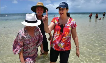  ??  ?? Annastacia Palaszczuk campaigned in the Cairns electorate on Tuesday with the tourism minister, Michael Healy. Photograph: Darren England/AAP