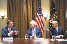  ?? Joshua Roberts / Bloomberg ?? From left, U.S. Sen. Chris Murphy, D-Conn., speaks with Senate Majority Whip John Cornyn, R-Texas, and President Donald Trump at the White House on Feb. 28.