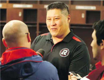  ?? — POSTMEDIA NEWS FILES ?? Redblacks offensive line coach Bryan Chiu has no desire to put on the pads again despite overseeing an injury ravaged group missing last year’s top CFL lineman — SirVincent Rogers.