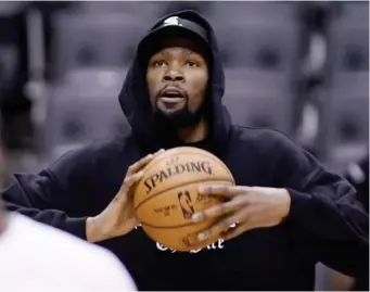  ?? (AP) ?? WARRIORS forward Kevin Durant watches during basketball practice at the NBA Finals in Toronto, Saturday, June 1, 2019.