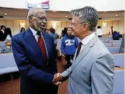  ?? [PHOTO BY PRICE CHAMBERS, FOR THE TENNESSEAN] ?? The Rev. Kelly Miller Smith Jr. greets members of the congregati­on at Nashville First Baptist Church on April 22. Smith, the pastor from First Baptist Church, Capitol Hill, swapped pulpits with the Rev. Frank Lewis for the day.