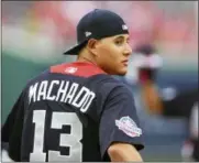  ?? NICK WASS — THE ASSOCIATED PRESS ?? Baltimore Orioles shortstop Manny Machado looks over his shoulder as he walks onto the field before the Major League Baseball All-star Game Tuesday in Washington.