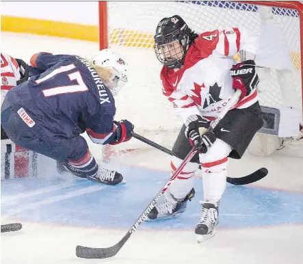  ?? RYAN REMIORZ/THE CANADIAN PRESS FILE ?? Jocelyne Lamoureux-Davidson, left, and her Team USA teammates agreed to a four-year deal, reports say.