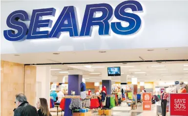  ??  ?? Retail experts say Sears department stores are trying to play catch-up to online shopping, but are failing.