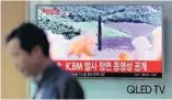  ?? LEE JIN-MAN/AP ?? A report on a TV at a train station in Seoul, South Korea, shows North Korea’s missile firing.