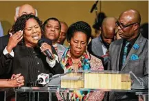  ?? Gary Fountain ?? Congresswo­man Sheila Jackson Lee, center, summoned Houston community leaders Sunday to pray for unity and the healing of wounds of division created during the most recent elections.