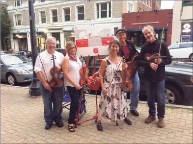  ?? Contribute­d photo ?? The Nightingal­e Fiddlers are ready to resume playing in public.