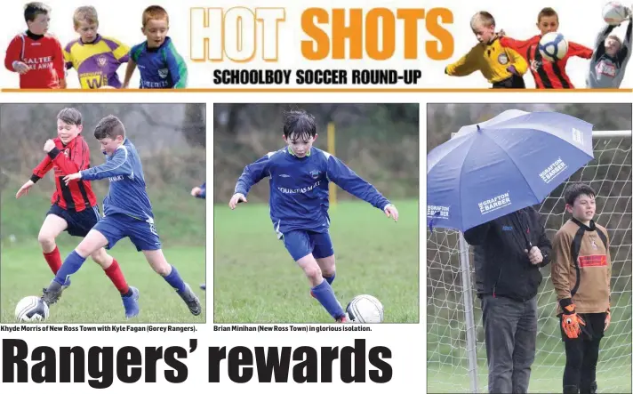  ??  ?? Khyde Morris of New Ross Town with Kyle Fagan (Gorey Rangers). Brian Minihan (New Ross Town) in glorious isolation. Gorey Rangers goalkeeper Tom Leonard taking shelter from the rain.