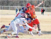  ?? MIKE CAUDILL/FREELANCE FILE ?? Lake Taylor’s Malik Newton, right, evades multiple Patrick Henry-Ashland defenders on Dec. 7, 2019.