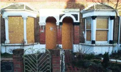  ?? Photograph: Martin Godwin/The Guardian ?? A boarded-up house in South London.