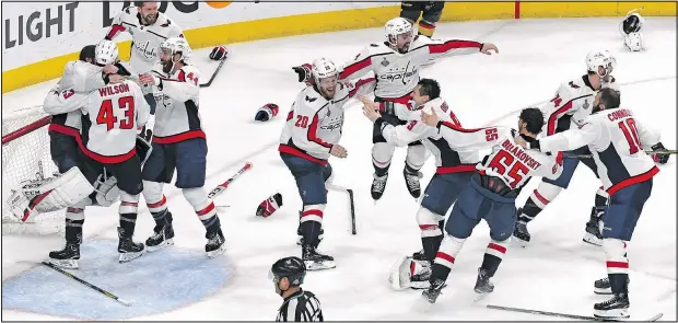  ?? Getty Images ?? The Washington Capitals whoop it up Thursday night after their 4-3 win over the Golden Knights secured the first Stanley Cup in team history. —