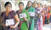  ?? PTI ?? Women wait to cast their vote during repolling at a booth in Daskroi constituen­cy of Ahmedabad on Sunday.