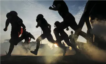  ??  ?? The National Federation of State High School Associatio­ns said participat­ion in 11-man football dropped by 30,829 to 1,006,013, the lowest mark since the 1999-2000 school year. Photograph: Don Campbell/AP