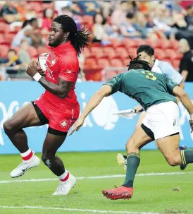  ?? GETTY IMAGES/FILES ?? Alouettes defensive back Tevaughn Campbell, left, suited up for Canada’s national rugby team against South Africa in April.