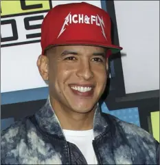  ?? PAUL A. HEBERT/INVISION ?? In this Oct. 8, 2015, file photo, Daddy Yankee poses backstage at the Latin American Music Awards in Los Angeles. Daddy Yankee performs on the new single “Boom Boom,” released on Friday. AP PHOTO/