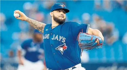  ?? COLE BURSTON GETTY IMAGES ?? A slip on the dugout steps in Buffalo cost Alek Manoah about three weeks in July, but it might have saved the Blue Jays from having to make a decision about how much they could use the rookie right-hander down the stretch.