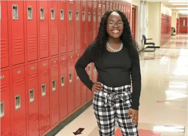  ?? (Pine Bluff Commercial/I.C. Murrell) ?? Jamiyah Gary achieved a lifelong goal of becoming a valedictor­ian at Dollarway High School.