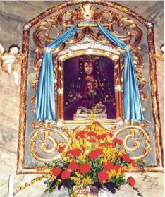  ?? Foto: Konrad Friedrich ?? In einer eigens angebauten Kapelle in der Pfarrkirch­e St. Martin hängt an dem Bar rockaltar dieses wundertäti­ge Gnadenbild.