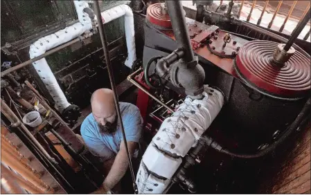  ??  ?? Above, Sabino engineer Jason Cabral works on installing a steam drain line from the pilot house to the exhaust.