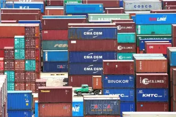  ??  ?? Shipping containers are seen at a port in Shanghai, China. — Reuters file photo